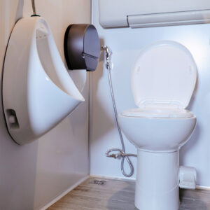 Male urinal setup in Flare portable restroom interior